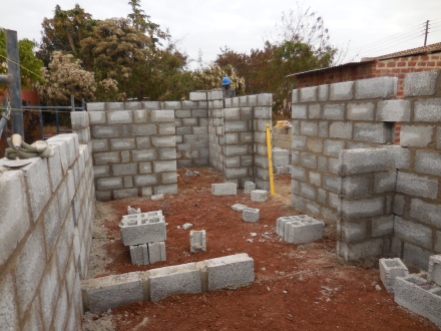 Three rooms are shaping up as we start on the 2 interior walls. Each home we are building will have three rooms that are 9ft x 9ft each.